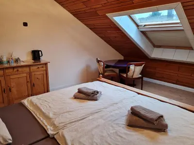 Ein Bett oder Betten in einem Zimmer der Unterkunft Landhaus Bad Rotenfels - Zion