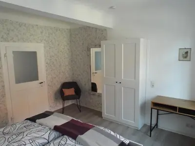 Ein Bett oder Betten in einem Zimmer der Unterkunft Ferienwohnung Mittendrin mit Parkplatz