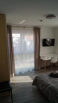 TV/Unterhaltungsangebot in der Unterkunft Flat11 4-Zi Wohnung Messe Karlsruhe