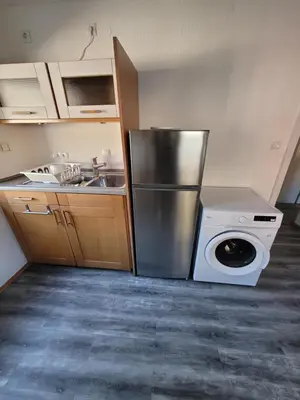 Küche/Küchenzeile in der Unterkunft City Apartment KL
