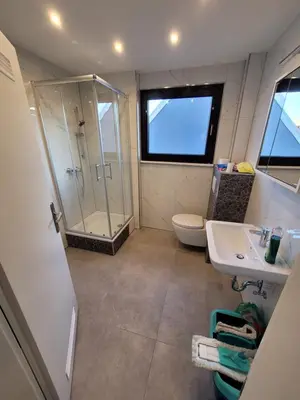 Ein Badezimmer in der Unterkunft City Apartment KL
