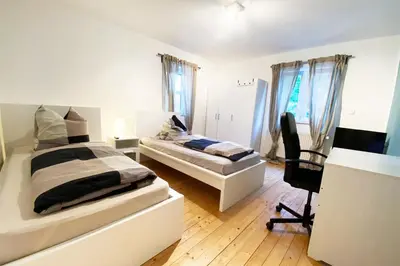 Ein Sitzbereich in der Unterkunft Work & Stay House