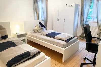 Ein Bett oder Betten in einem Zimmer der Unterkunft Work & Stay House