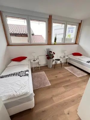 Ein Bett oder Betten in einem Zimmer der Unterkunft Ferienwohnungen Auf der Höhe