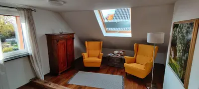 Ein Sitzbereich in der Unterkunft Tinyloft