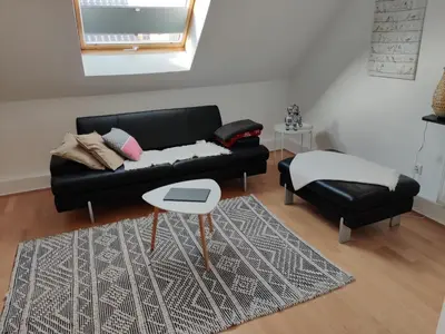 Ein Sitzbereich in der Unterkunft Tinyloft