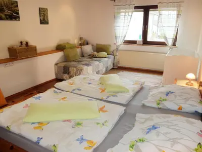 Ein Bett oder Betten in einem Zimmer der Unterkunft Haus Alpaka