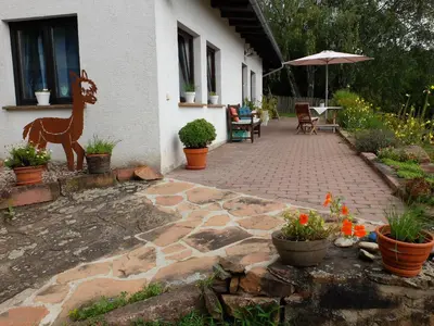 Ein Garten an der Unterkunft Haus Alpaka