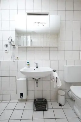 Ein Badezimmer in der Unterkunft Maisonette 2