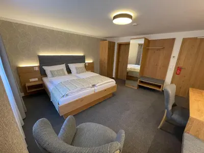 Ein Bett oder Betten in einem Zimmer der Unterkunft Gästehaus Klingler
