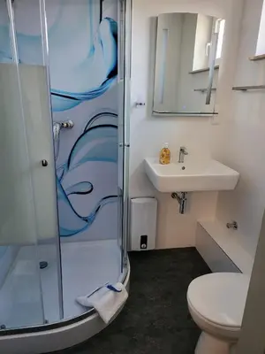 Ein Badezimmer in der Unterkunft Appart Hotel Roßdorf