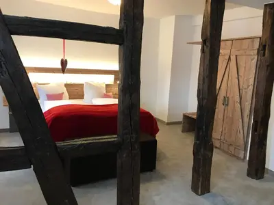 Ein Bett oder Betten in einem Zimmer der Unterkunft Hotel & Restaurant Zum Karpfen