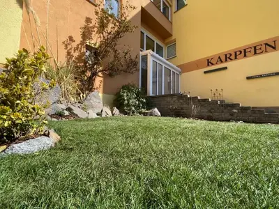 Ein Garten an der Unterkunft Hotel & Restaurant Zum Karpfen