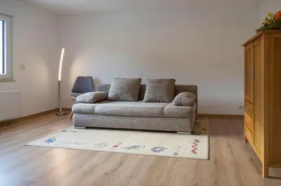 Ein Sitzbereich in der Unterkunft Ferienwohnung Zum Bienenstock