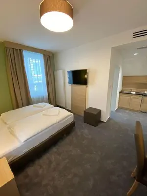 Ein Bett oder Betten in einem Zimmer der Unterkunft Hotel-an-den-Planken