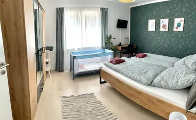 Ein Bett oder Betten in einem Zimmer der Unterkunft Schöne Ferienwohnung mitten im Pfälzerwaldgebiet