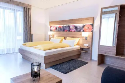 Ein Bett oder Betten in einem Zimmer der Unterkunft Gästehaus am Fürstweg