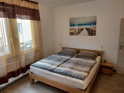 Ein Bett oder Betten in einem Zimmer der Unterkunft Ferienwohnung Popp