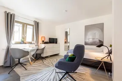 Ein Bett oder Betten in einem Zimmer der Unterkunft Appartement Champagne