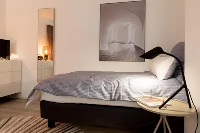 Ein Bett oder Betten in einem Zimmer der Unterkunft Appartement Champagne