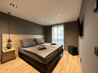 Ein Bett oder Betten in einem Zimmer der Unterkunft Apartment34