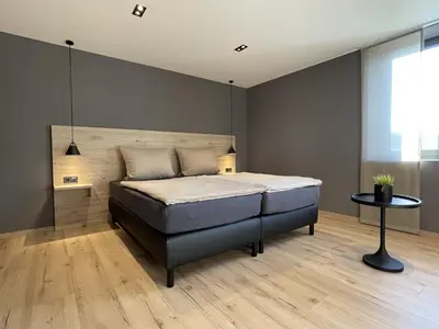 Ein Bett oder Betten in einem Zimmer der Unterkunft Apartment34