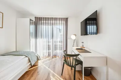 Ein Bett oder Betten in einem Zimmer der Unterkunft Gästehaus Hartwig