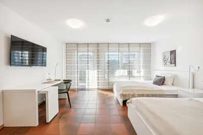 Ein Bett oder Betten in einem Zimmer der Unterkunft Gästehaus Hartwig