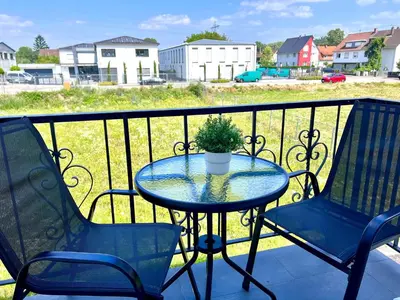 Ein Balkon oder eine Terrasse in der Unterkunft Prime Host Lovely Apartment