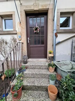 Eine Fassade oder ein Eingang zu Gästezimmer / Weingut Peter