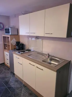 Küche/Küchenzeile in der Unterkunft Ferienwohnung Jasmin in Schönau bei Heidelberg FEWO 4 Souterrain