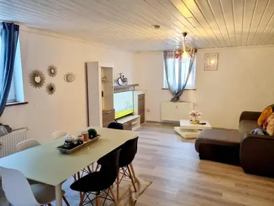 Ein Sitzbereich in der Unterkunft Cosy Apartment in Groß-Rohrheim – 87 m² – Sunny Terrace