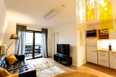 TV/Unterhaltungsangebot in der Unterkunft FESTWIESE - modernes Apartment nahe Neustadter Innenstadt