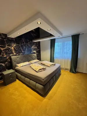 Ein Bett oder Betten in einem Zimmer der Unterkunft LifeStyle Apartment Sinsheim