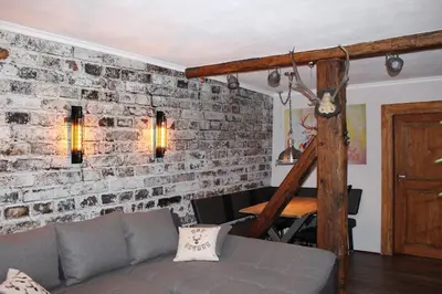 Ein Sitzbereich in der Unterkunft Appartement Altstadt, Gasthaus Hirsch