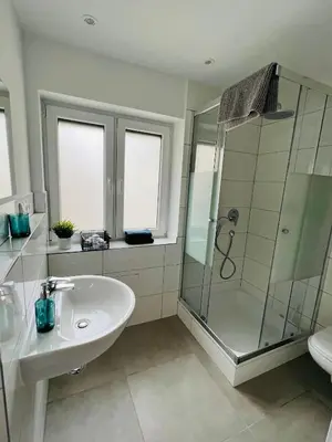 Ein Badezimmer in der Unterkunft Ferienwohnung K Heidelberg Sandhausen