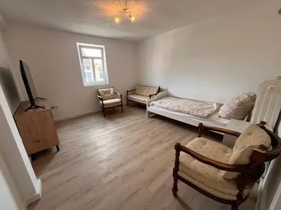 Ein Sitzbereich in der Unterkunft Monteurzimmer Reuhl - Ferienwohnungen Rodenstein