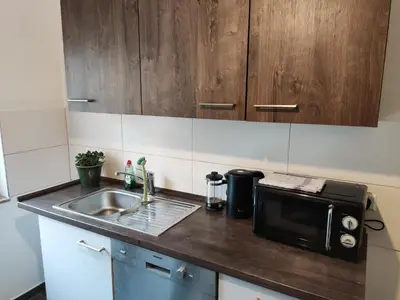 Küche/Küchenzeile in der Unterkunft ZEN Apartments - Exklusive Suite - Luxus - Boxspringbett