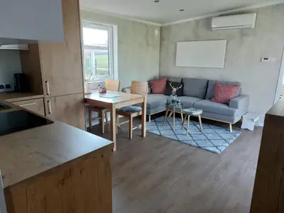 Ein Sitzbereich in der Unterkunft Gemütliches Landhauswohnen rent-by-seibold