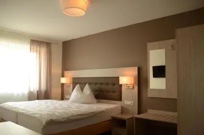 Ein Bett oder Betten in einem Zimmer der Unterkunft Pension die kleine Träumerei
