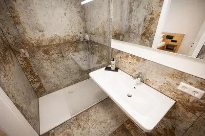Ein Badezimmer in der Unterkunft Rübli