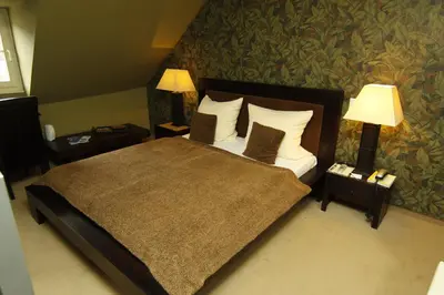 Ein Bett oder Betten in einem Zimmer der Unterkunft Art Hotel Neckar
