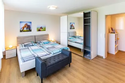 Ein Bett oder Betten in einem Zimmer der Unterkunft Pferdehof Bischof