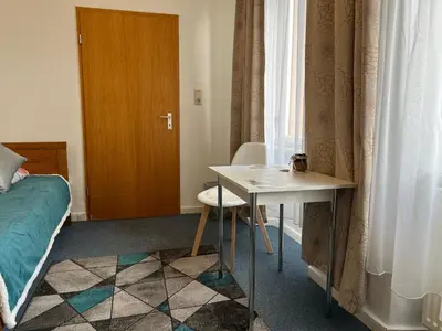 Ein Sitzbereich in der Unterkunft Ferienappartements Dolgesheim