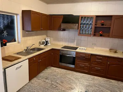 Küche/Küchenzeile in der Unterkunft Ferienappartements Dolgesheim 3