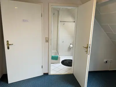 Ein Badezimmer in der Unterkunft Ferienappartements Dolgesheim 5