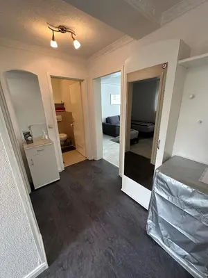 Ein Bett oder Betten in einem Zimmer der Unterkunft Ruhige geräumige Wohnung