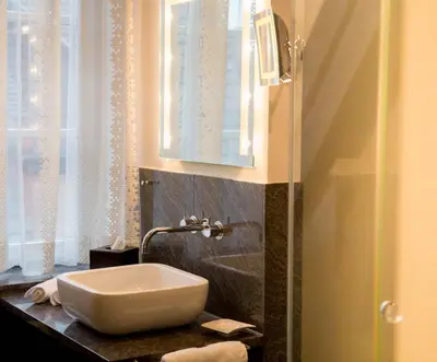Ein Badezimmer in der Unterkunft TRIP INN Kaiser Hotel & Restaurant Heidelberg-Schriesheim