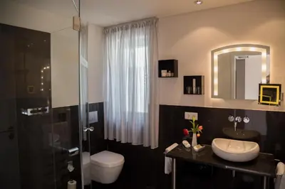 Ein Badezimmer in der Unterkunft TRIP INN Kaiser Hotel & Restaurant Heidelberg-Schriesheim