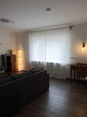 Ein Sitzbereich in der Unterkunft Ferienwohnung am Schönbach